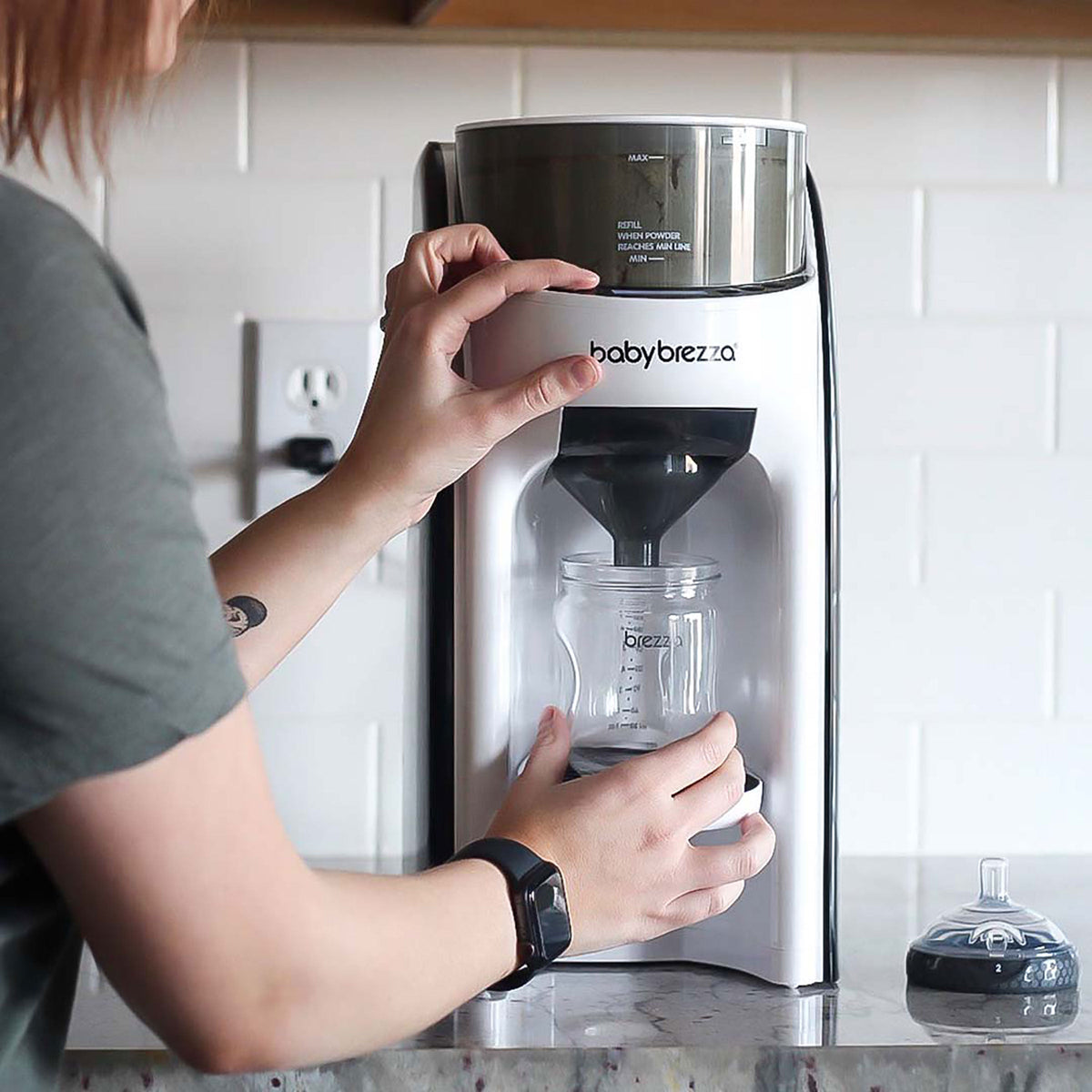 Person using the baby formula machine #variant_white